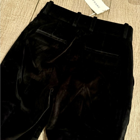 FRAME Slim Stacked Velvet Trousers in Black. - Picture 8 of 10